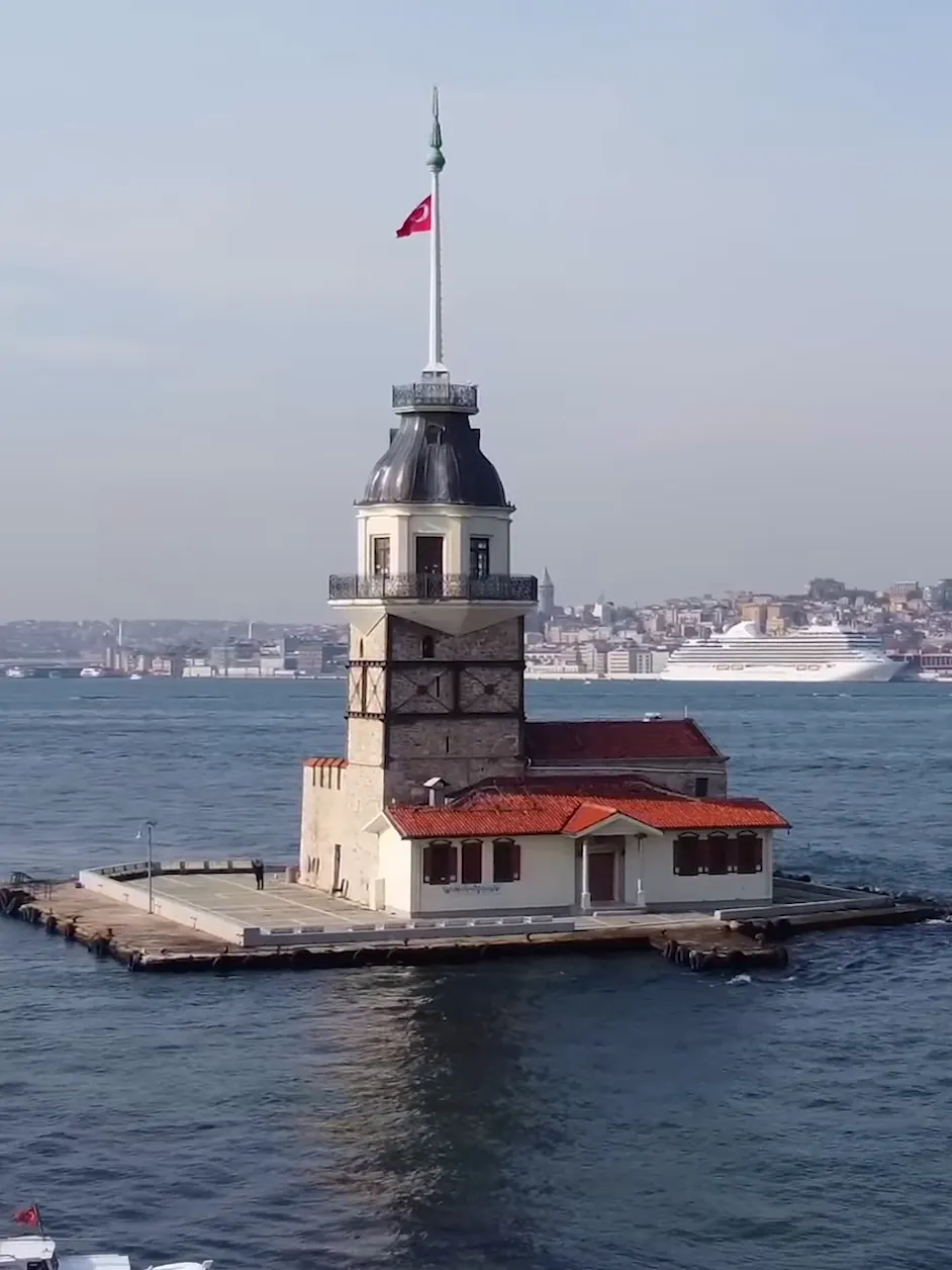The Maiden's Tower on its islet in the Bosphorus, Galata and the European shore behind, late in the afternoon